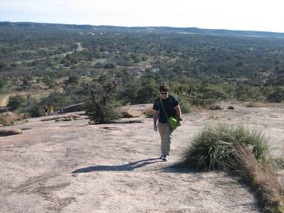 Hiking up the hill.  The size of this big rock is really...