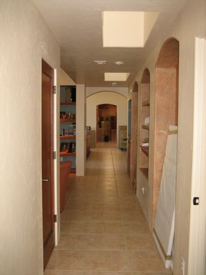 The long hallway from master bedroom (where photographer...
