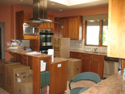 Kitchen, full of boxes.