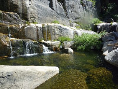 The pool at the bottom of the big falls, just to the...