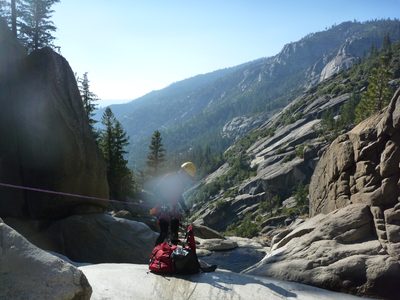 John begins a rap with his bag attached to his harness. ...