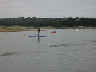 The course was monitored with people on stand-up paddle...
