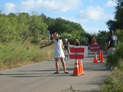 Catherine comes in to the bike dismount line.  The lady...