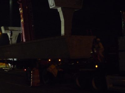 Step 1: Deliver a beam on a big truck.