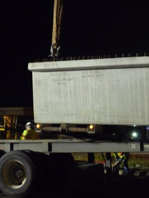 Step 2: hook the beam up to a crane.  110.39 ft beam.
