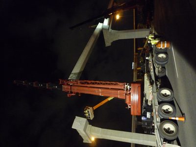 And now the beam is fully on the correct side of the cranes.