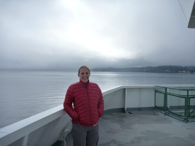 Catherine on the very windy, very cold bow of the Puyallup.