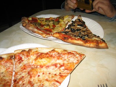 Four slices of pizza and a pint of beer for $14.  Not too bad!