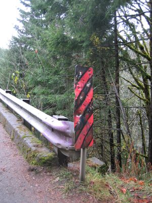Ah, roadsigns.  Always good for target practice.