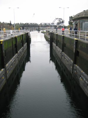 The small lock ready to accept boats from the Sound. ...