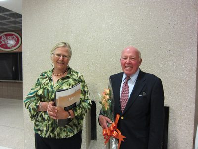 Mom and Dad, looking proud.