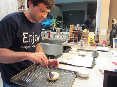 Jay egg-washing his bagel before applying toppings. ...