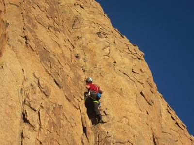 Jay climbs above the first chicken head pro.  Above, you...