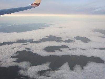 An ocean of low-lying clouds forms mountain-islands on...
