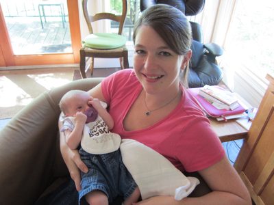 Kim with her new little baby.