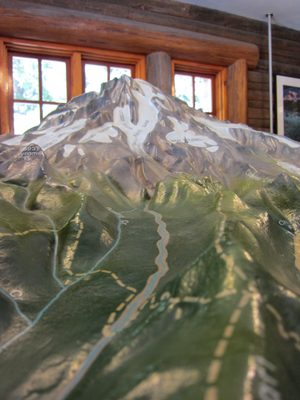 Trying to look at Rainier on a topo map at the Longmire...