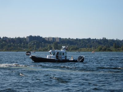 The local police boat, complete with triple 350 motors,...
