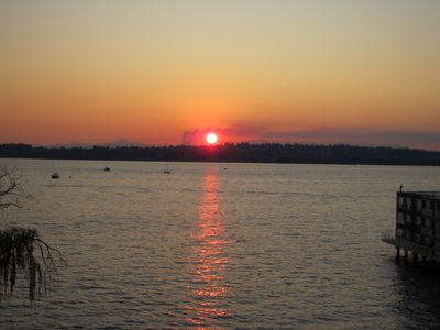 Sunset viewed across the lake from Bob and Lucie's. ...