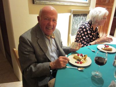 Dad, showing off the key lime pie he made for dessert,...
