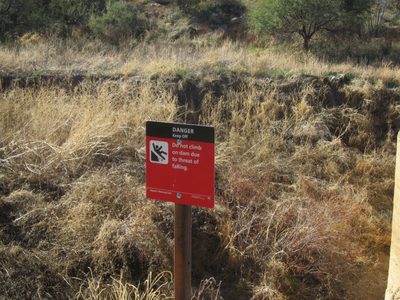 Danger sign near the dam.