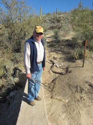Dad standing on the dam.