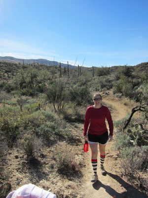 Catherine hikes.  Note the pj pants tucked into John's...