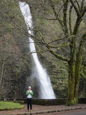 Emily with Horsetail Falls behind her.