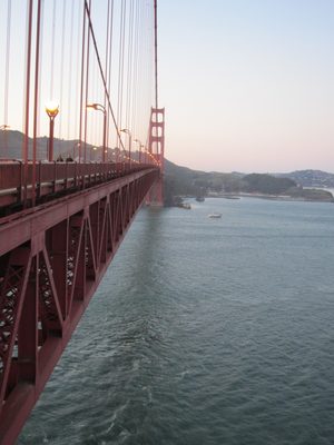 Looking at the side of the bridge and the visible arch.