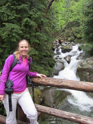 Diana with the waterfall that ran under the fake wooden bridge.