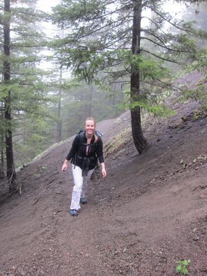 Diana hikes through the woods.  The amount of fog was a...