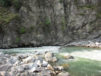 Looking downriver of the falls and at the cliffs on the...