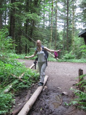 Diana navigates some mud at the trailhead.