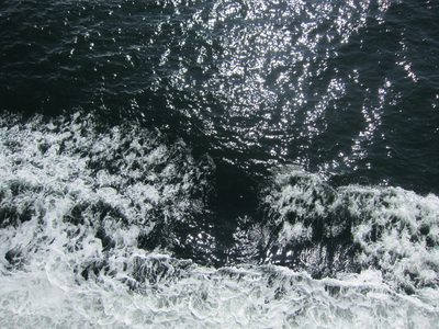 Water crashes off the bow of the Spirit of British...