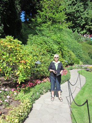 Mom wanders the paths.