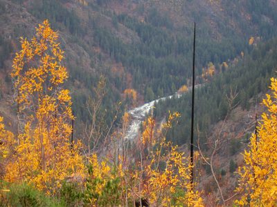 Looking down at a bridge over the Wenatchee River, next to US 2.