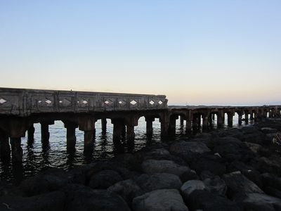 Near the launching dock was a very sad pier that was...