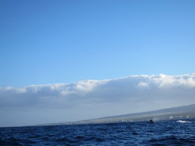 Not the clearest shot, but this is a whale breaching.