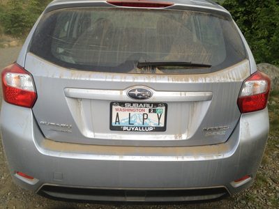 Frank's car after having driven up the dirt road to the...