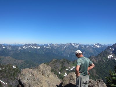 Frank looks down over the back of Mt Ellinor, with other...