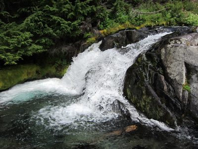Beautiful waterfall next to the 4th Crossing Trail...