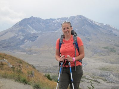 Catherine ready for a hike in front of the mountain. I...