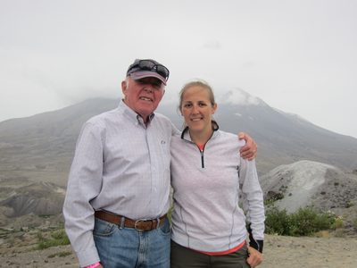 Dad and Catherine with part of Mt St Helen's in the...