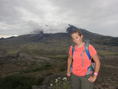 Sad face over the mountain hiding in the clouds. Final...