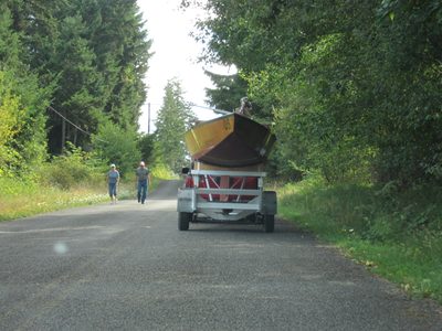 Driving down the street.