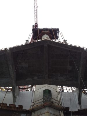 Looking up at the bottom of the sidewalk as it skirts...
