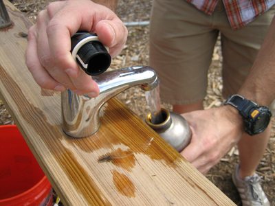 Closer view of the faucet setup.