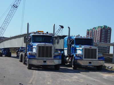 Girders on trucks.
