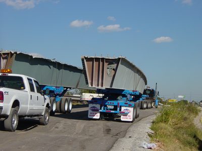 Back of girders on trucks.