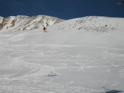John cuts hard skier's left to get in the less-touched snow