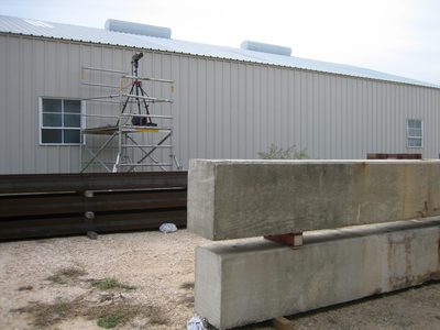 One of the high-speed cameras and concrete blocks to...